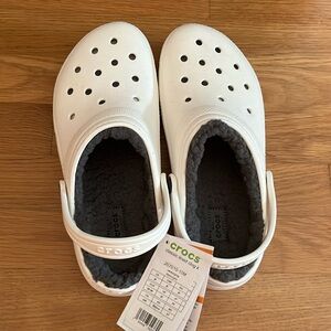 Brand new with tags, boys white crocs lined w/ grey fleece.